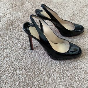 Louboutin red bottom shoes